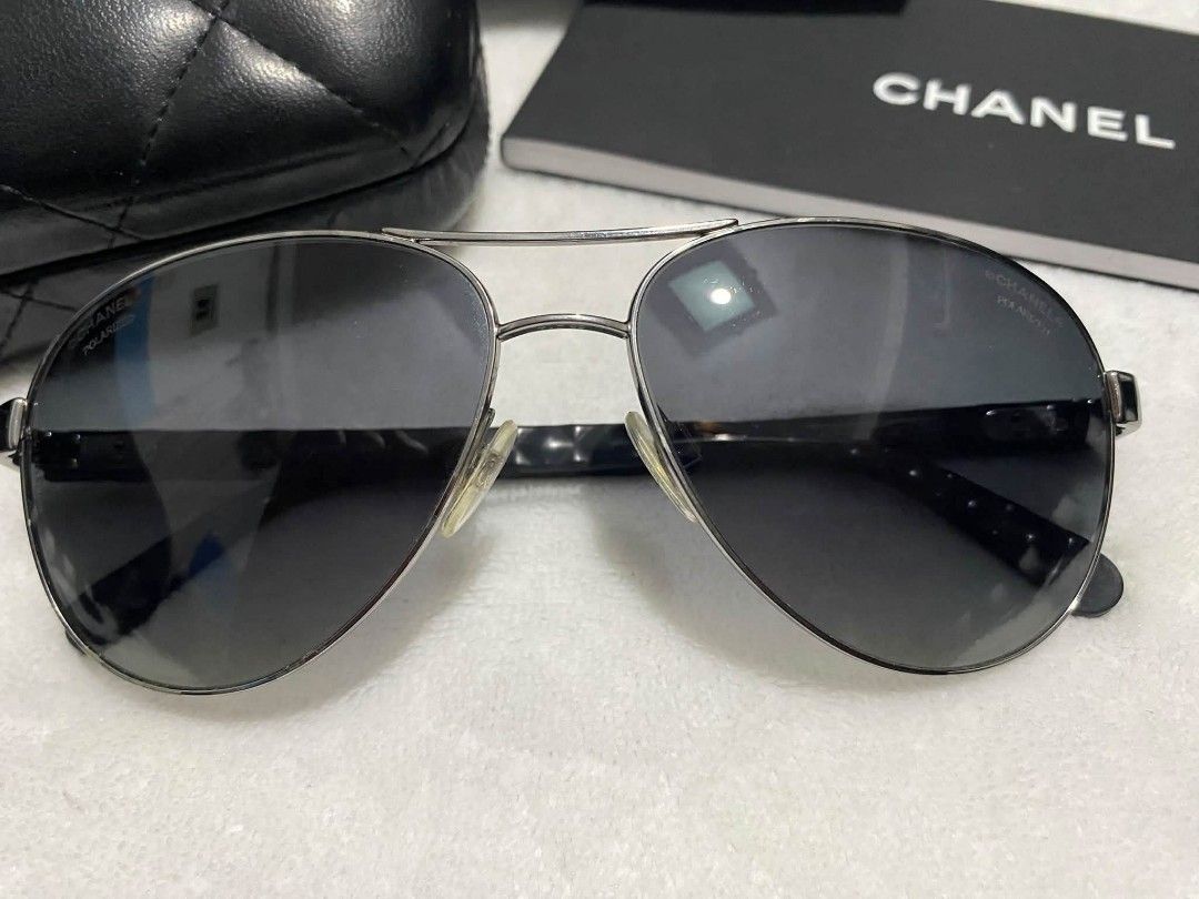 Eyewear unisex (Category: Sunglasses & Eyewear) located in Baguio. Submitted by aine_laine (Listing ID 1469161823, Image 2). Description: Chanel Aviator Polarized Sunglasses 4204-Q, distinguished by their classic silvertone metal frames and signature quilted detailing on the temples 2nd hand/preloved.