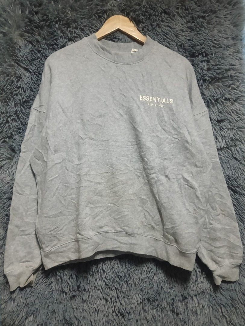 Fear of God Essentials Sweatshirt (Category: Coats, Jackets and Outerwear) located in Manila. Submitted by thrift_marvs (Listing ID 1469123473, Image 1). Description: Fear of God Essentials Sweatshirt Excellent Condition Need Wash / Newly Hook Size Medium Boxy Fit Dimension, Width 26 Length 27 980 plus shipping fee.