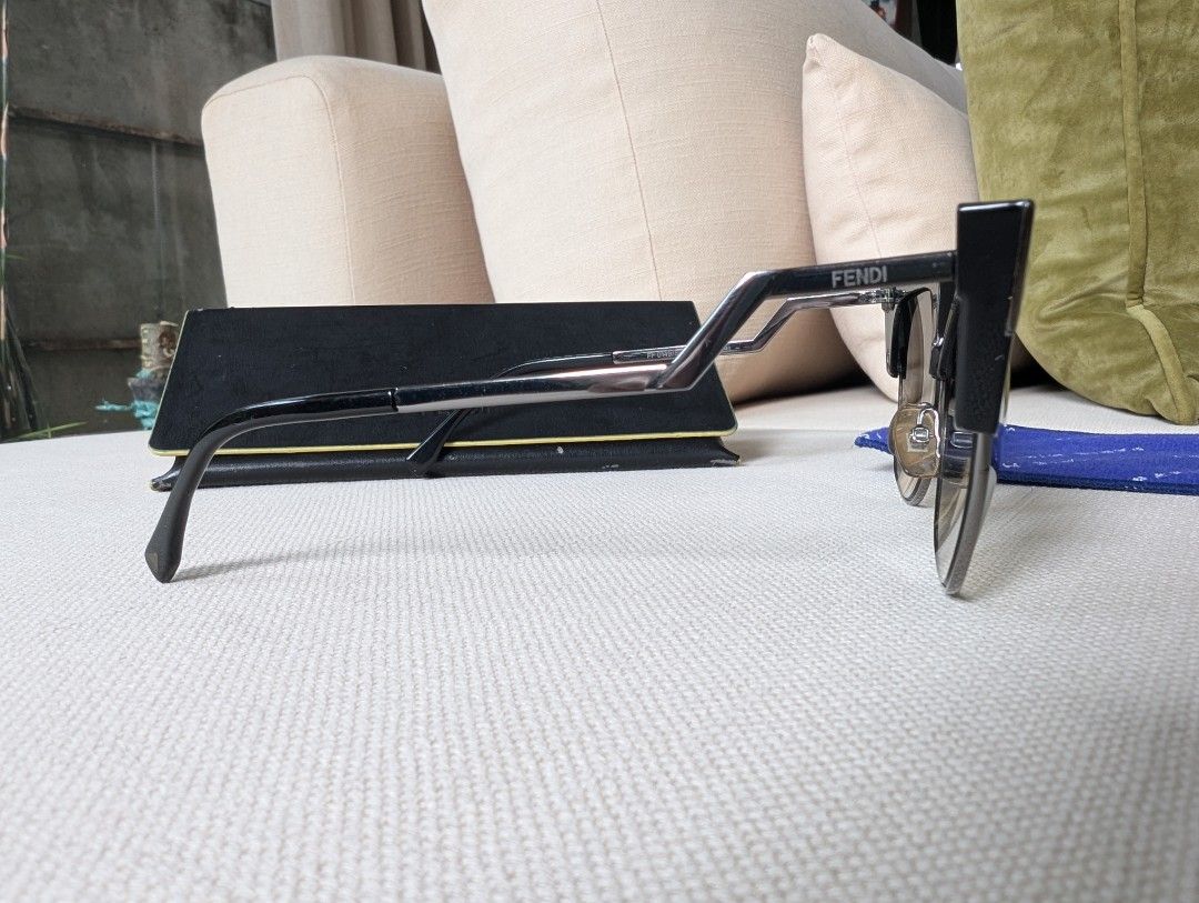 Fendi Cat-Eye Sunglasses (Category: Sunglasses & Eyewear) located in Pasig City. Submitted by ejereyes (Listing ID 1468971031, Image 3). Description: Fendi FF 0149/S (Iridia) Cat-Eye Sunglasses Guaranteed authentic Comes with complete original packaging - Original Fendi hard case, authenticity certificate card, and Fendi cleaning cloth Honest issues: Case material has minor peeling. This does not affect ths condition of the sunglasses :) RFS: Dow