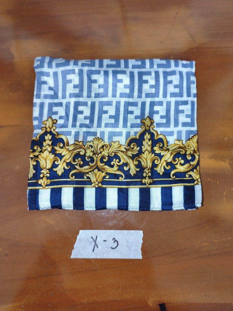 Fendi designer patterned silk pocket square handkerchief scarf (Category: Scarves) located in Manila. Submitted by declutterpromax (Listing ID 1468992560, Image 3). Description: - Authentic Fendi pocket square scarf bundle - Includes 5 different designs with classic FF logos, animal prints, and baroque borders - Versatile styling: perfect for accessorizing bags or wearing around the neck - Great value lot with multiple pattern options - Marked wi