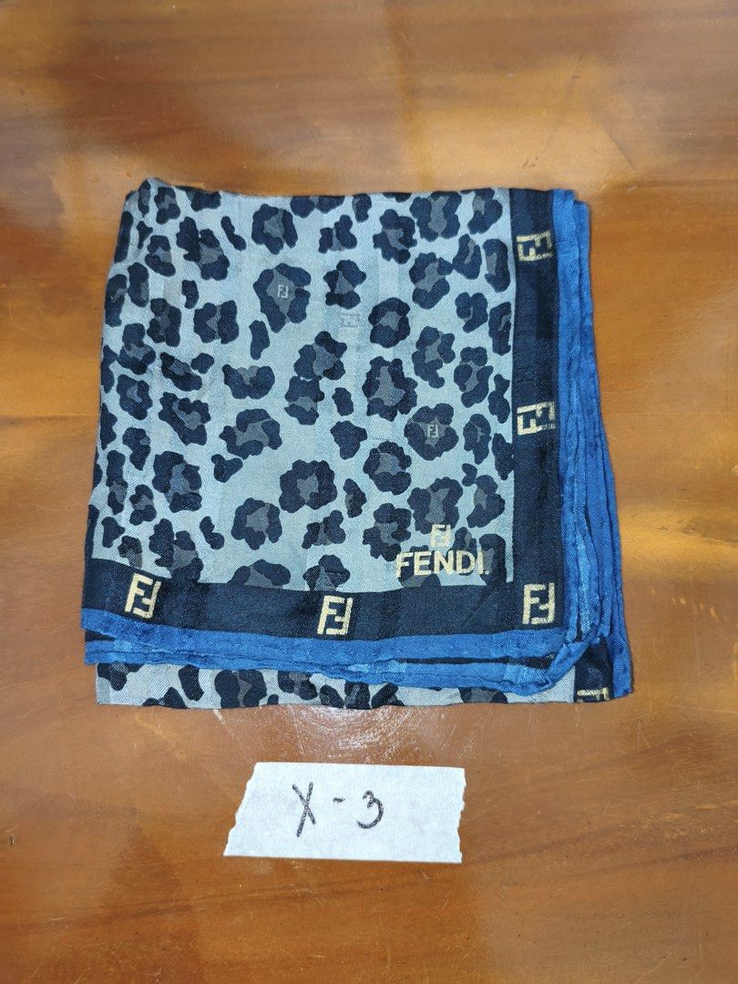 Fendi designer patterned silk pocket square handkerchief scarf (Category: Scarves) located in Manila. Submitted by declutterpromax (Listing ID 1468992560, Image 2). Description: - Authentic Fendi pocket square scarf bundle - Includes 5 different designs with classic FF logos, animal prints, and baroque borders - Versatile styling: perfect for accessorizing bags or wearing around the neck - Great value lot with multiple pattern options - Marked wi