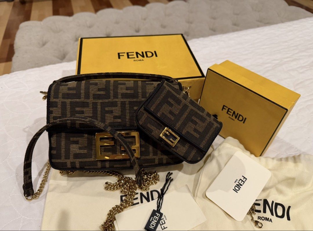 Fendi FF Monogram Brown Fabric Shoulder Bag with Micro Bag (Category: Luxury Bags & Wallets) located in Pasig City. Submitted by fz718 (Listing ID 1468949041, Image 1). Description: - Authentic Fendi FF monogram pattern on brown fabric - Elegant gold-tone hardware with classic clasp closure - Versatile design with removable strap options - Includes matching micro bag attachment - Complete with original Fendi yellow box, dust bag, and tags - 100% 