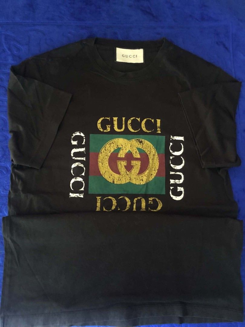 Fendi FF Monogram Lace Black T-Shirt (Category: Shirts) located in Manila. Submitted by wonderboi80 (Listing ID 1468981188, Image 3). Description: Fendi black t-shirt made from lace fabric. All-over FF monogram pattern throughout the body and sleeves. Classic crew neck design. Interior brand label stitched near the collar. Care label shows size information and material composition clearly. Made in Italy construction..