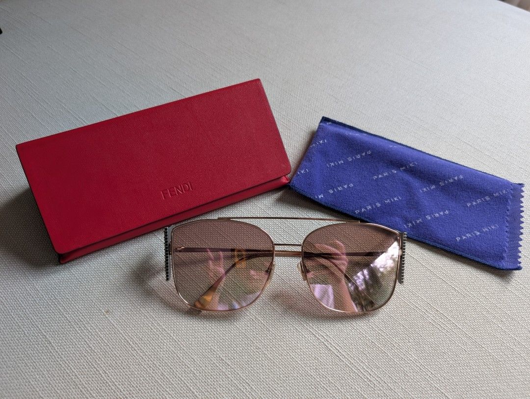 Fendi FFreedom Square Sunglasses (Category: Sunglasses & Eyewear) located in Pasig City. Submitted by ejereyes (Listing ID 1468972859, Image 2). Description: Fendi FFreedom (FF0380/G/S) Square Sunglasses - Rose gold frame Guaranteed authentic Comes with original case and Paris Miki sleeve RFS: Downsizing personal collection Location is in Ugong, Pasig.