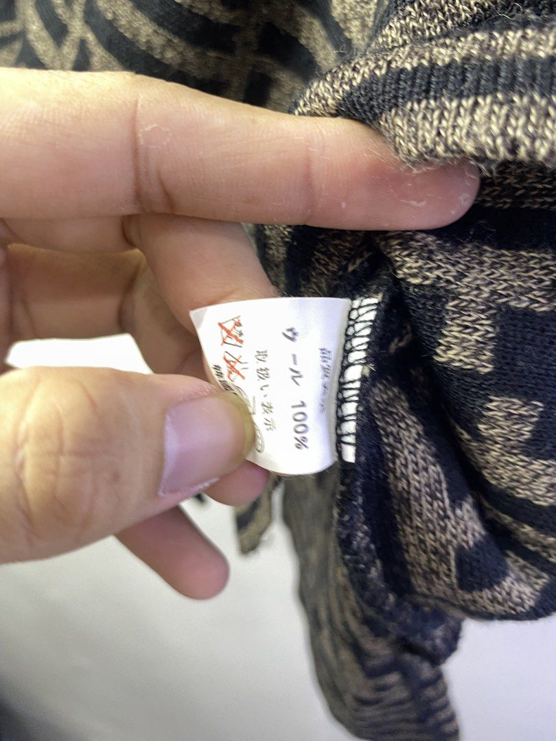 Fendi Monogram Turtleneck Wool Sweater Brown Black (Category: Coats, Jackets and Outerwear) located in Manila. Submitted by declutterpromax (Listing ID 1468997462, Image 2). Description: - Brand: Fendi - Style: Turtleneck sweater with allover FF monogram print - Colorway: Classic black and brown - Material: 100% wool (tag attached) - Details: Striped ribbed collar, cuffs, and hem - Measurements: 21" chest, 25" length, 19" sleeves - Condition: Exc
