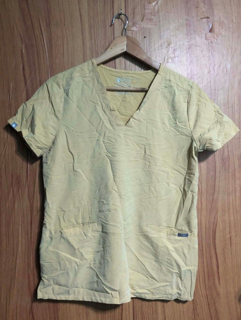 Figs Limited Edition Light Gold Casma (Small on Tag) (Category: Others Tops) located in Baguio. Submitted by ogiesiomai23 (Listing ID 1469091164, Image 3). Description: Limited Edition Light Gold Casma Manual Measurements (Medida) W:40" Shoulders Width: 15" L:25" Tag: Small 3 Pockets Nicer in Actual Yung Kulay Like New to Good as Last Price: P1,500 + SF.
