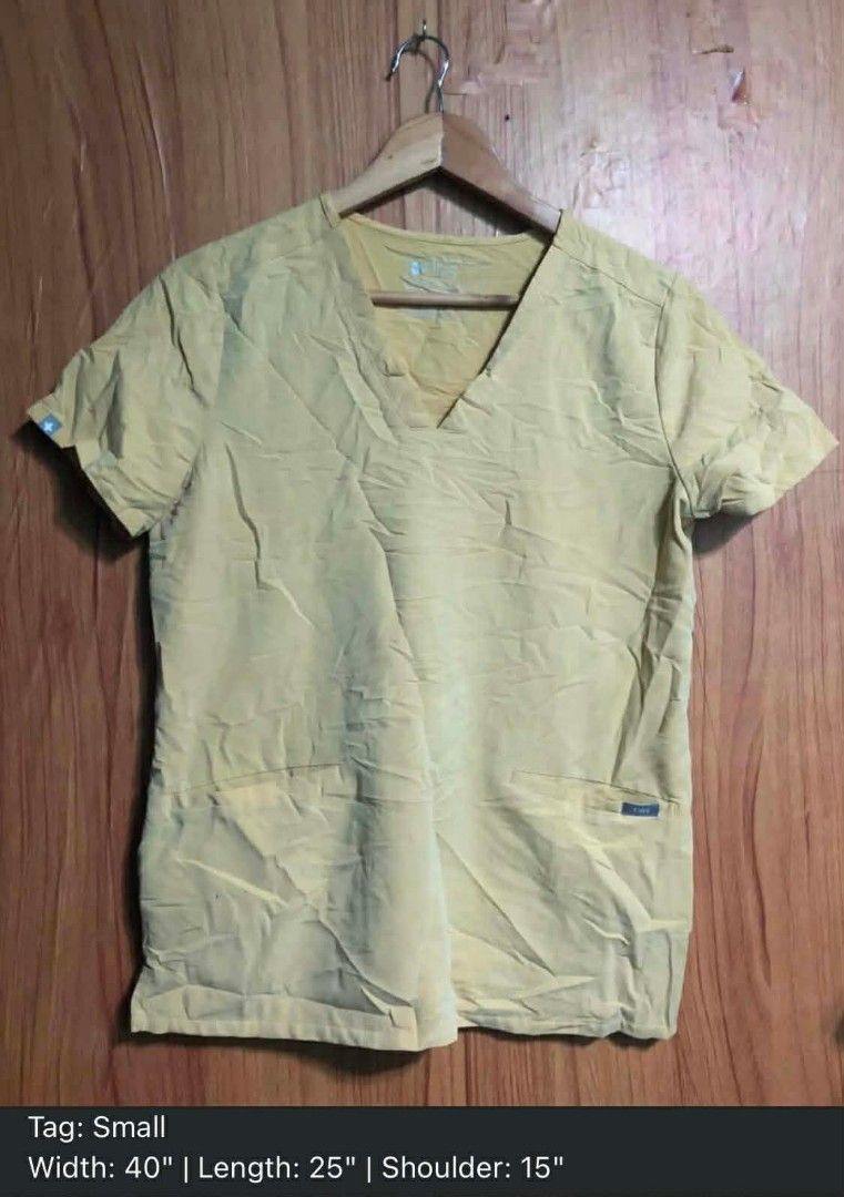 Figs Limited Edition Light Gold Casma (Small on Tag) (Category: Others Tops) located in Baguio. Submitted by ogiesiomai23 (Listing ID 1469091164, Image 2). Description: Limited Edition Light Gold Casma Manual Measurements (Medida) W:40" Shoulders Width: 15" L:25" Tag: Small 3 Pockets Nicer in Actual Yung Kulay Like New to Good as Last Price: P1,500 + SF.
