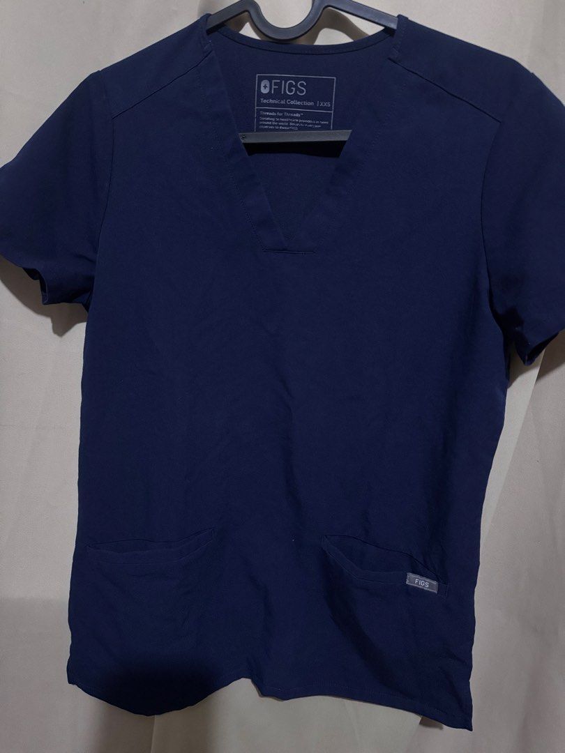 FIGS Technical Collection Top in Navy Blue (Category: Others Tops) located in Binan City. Submitted by mscocobutter (Listing ID 1469030994, Image 1). Description: FIGS Scrubs Top Casma size XXS in Navy blue 💙.