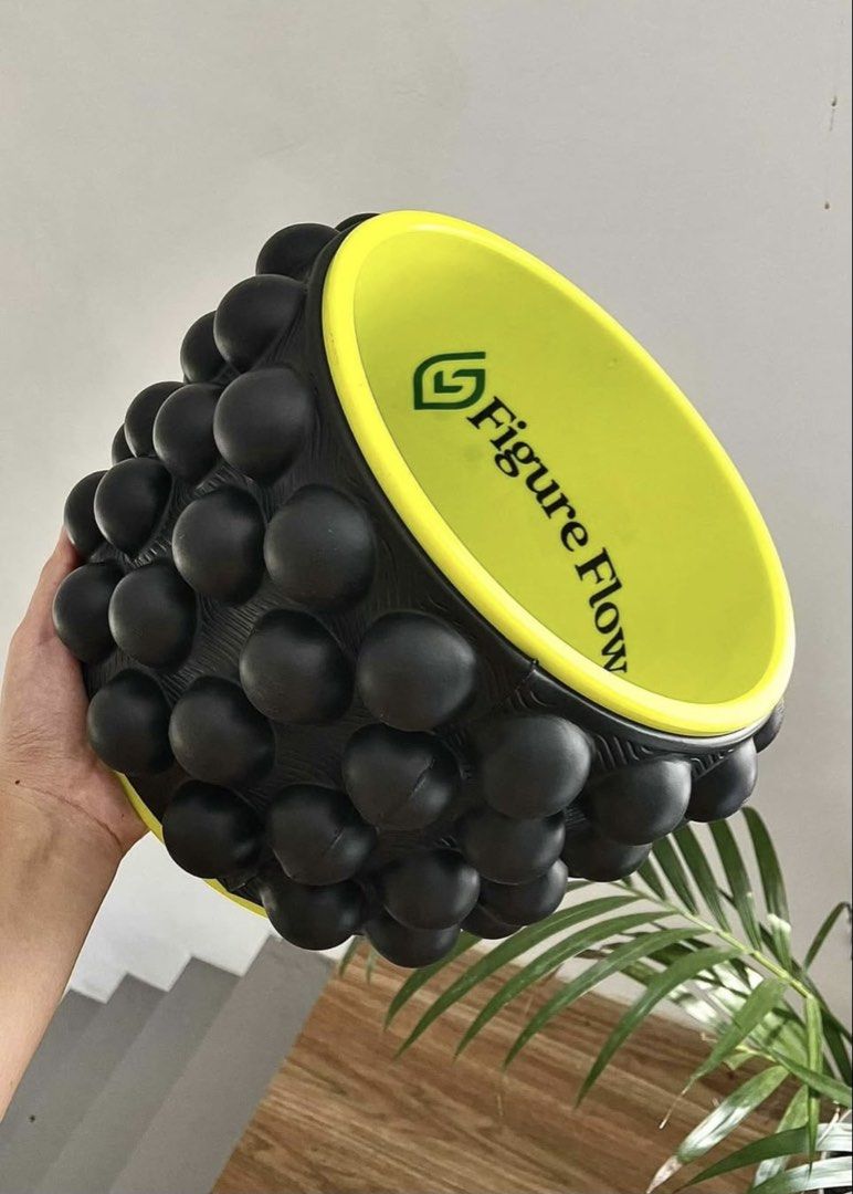 Figure Flow Yoga Back Roller with Trigger Points (Category: Toning & Stretching Accessories) located in Manila. Submitted by thatgirl0001 (Listing ID 1468952883, Image 1). Description: - Item: Figure Flow Back Roller - Color: Black with bright yellow inside - Design: 4 rows of bumps (64 total trigger points) with a built-in spine canal for safety - Benefits: Perfect for cracking your back, deep tissue massage, stretching, and relieving muscle ten