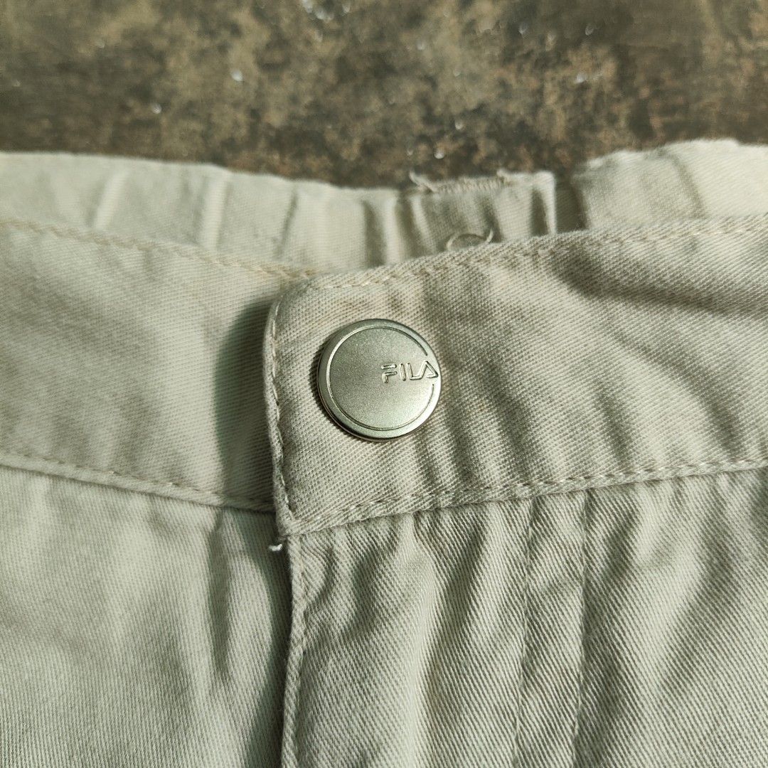 Fila Khaki Shorts (Category: Shorts) located in Rosales. Submitted by kudoscache (Listing ID 1469066414, Image 3). Description: - Brand: Fila - Waist: 28-30 | Length: 19 - Color: Khaki / Beige - slightly nego payment: maribank / gotyme courier: J&T.