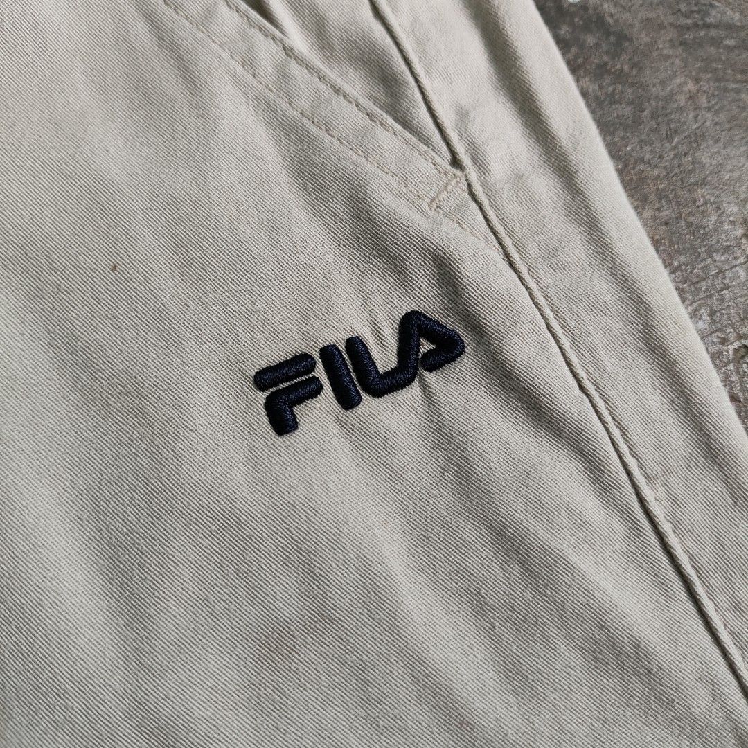 Fila Khaki Shorts (Category: Shorts) located in Rosales. Submitted by kudoscache (Listing ID 1469066414, Image 2). Description: - Brand: Fila - Waist: 28-30 | Length: 19 - Color: Khaki / Beige - slightly nego payment: maribank / gotyme courier: J&T.