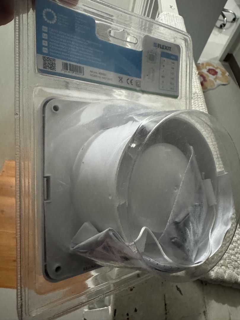 Flexit 100 B P Bathroom Fan with Pull Cord Switch (Category: Fans) located in Cavite. Submitted by marcuz1316 (Listing ID 1469091446, Image 2). Description: Flexit 100 B P bathroom fan, white plastic housing with horizontal louvers. Operates via pull cord switch. 100 mm outlet diameter. Sealed inside original clear plastic blister packaging. Mounting hardware, screws, wall plugs, and installation manual included inside the pack. Unopened packagin
