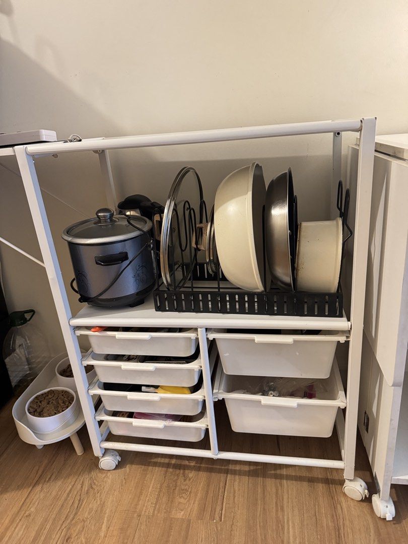 Folding Mobile Kitchen Storage Trolley Table Counter / Dish Rack (Category: Tables & Sets) located in Manila. Submitted by angelicacdc (Listing ID 1469057251, Image 2). Description: * Type: Rolling kitchen storage trolley * Features: Multiple pull-out storage drawers + top work surface * Foldable table * Material: Metal frame/plastic drawers * Condition: used condition; normal wear, 1 flaw the big drawer is loose * Measurements: Approx. 75 × 45 ×