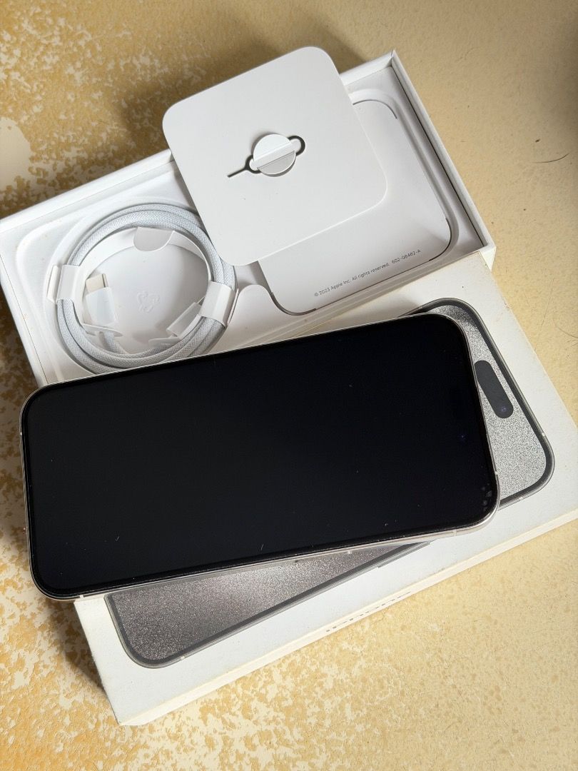 For sale - Iphone 15 pro (Category: iPhone 15 Series) located in Binan City. Submitted by jade_____ (Listing ID 1469029427, Image 3). Description: Iphone 15 Pro 256GB White titanium No Sim Restriction 87% Battery health All working, No issues, no repair Smooth, Complete cord with box..