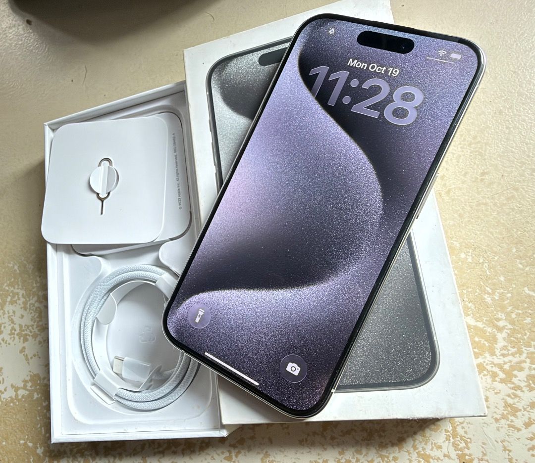 For sale - Iphone 15 pro (Category: iPhone 15 Series) located in Binan City. Submitted by jade_____ (Listing ID 1469029427, Image 1). Description: Iphone 15 Pro 256GB White titanium No Sim Restriction 87% Battery health All working, No issues, no repair Smooth, Complete cord with box..
