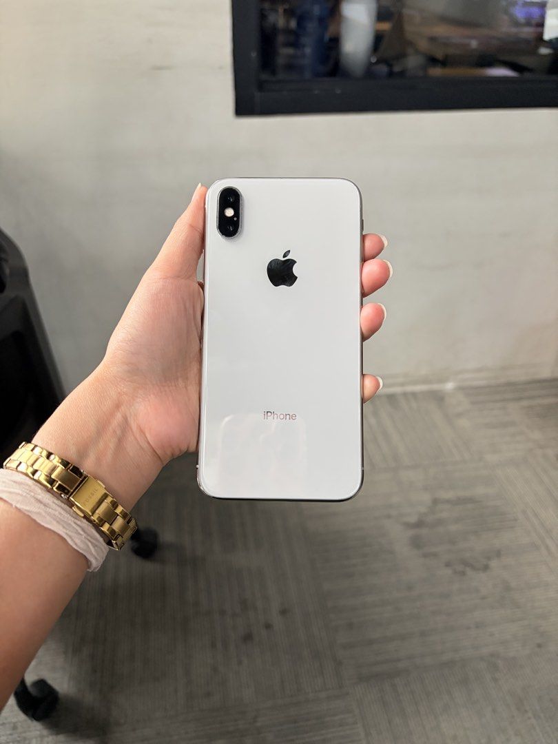 FOR SALE IPHONE X SILVER (Category: iPhone X Series) located in Manila. Submitted by kniccknacks (Listing ID 1469070686, Image 2). Description: FOR SALE ‼️📱 iPhone X – Silver | 64GB Condition & Details: * All buttons are fully functional * Has scratches on the sides * With repair history (LCD and battery replaced) * Face ID is working * Heats up when used while charging * No charging cable and box included * PHP 8,000 📍Makati City | San Pablo C