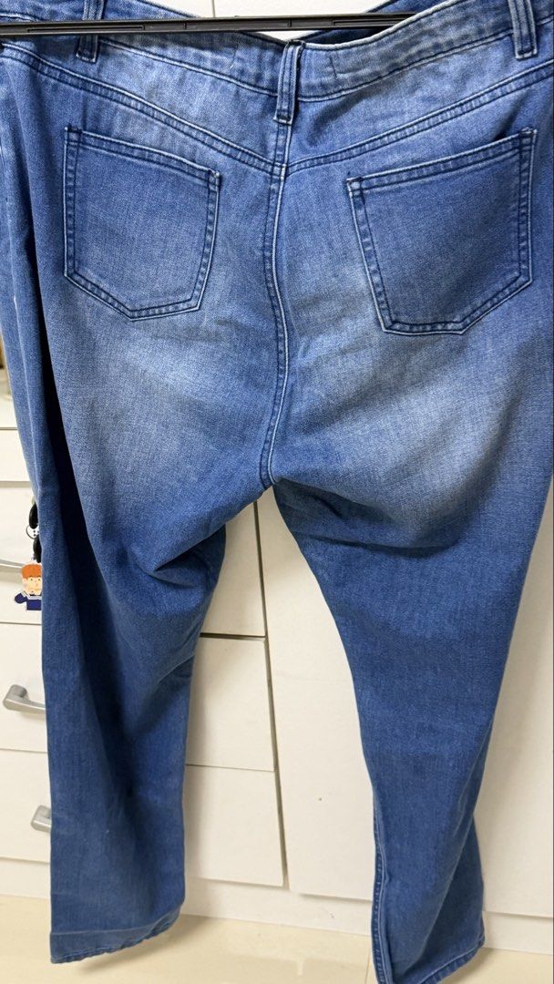 Forme Distressed Jeans Blue Denim Size 32 (Category: Jeans) located in Manila. Submitted by nayeoniescart (Listing ID 1469102026, Image 2). Description: - Brand: Forme - Size: 32 (tagged) - Color/Wash: Mid-wash blue denim with light fading - Style: Distressed with rips on both knees and thighs - Features: Classic five-pocket design, button closure - Condition: Good overall condition MOD: LBC / JNT — loc: bulacan MOP: GCASH.