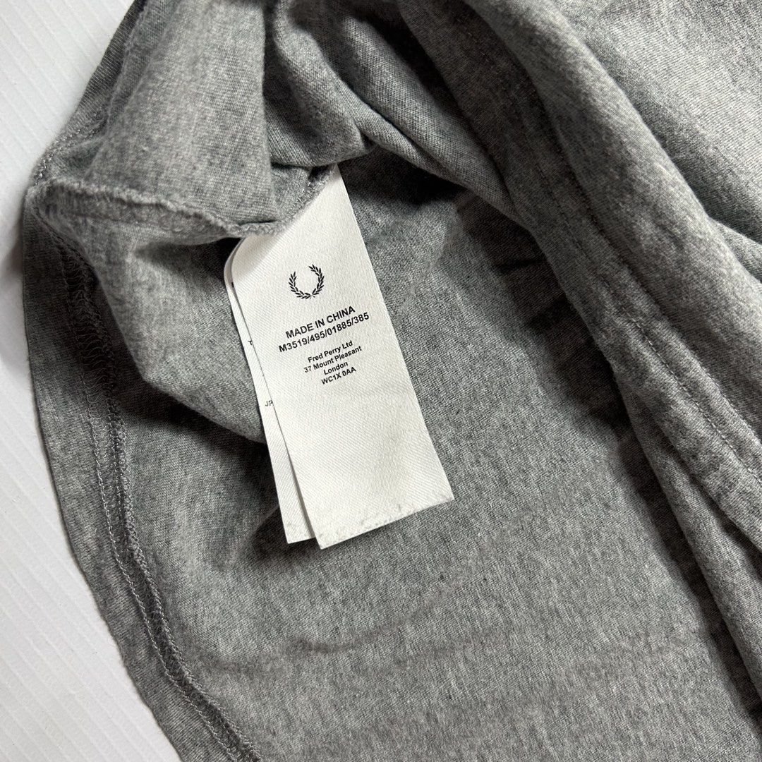 Fred Perry Ringer Shirt (Category: Tshirts & Polo Shirts ) located in Antipolo. Submitted by wvyfrnds (Listing ID 1469016666, Image 3). Description: Fred Perry Ringer Shirt Size: M Color: Gray Dimensions (Inches): Length: 27 Width: 20.5 Color Rate: 9/10 Issues - NONE 395 PLUS SF.