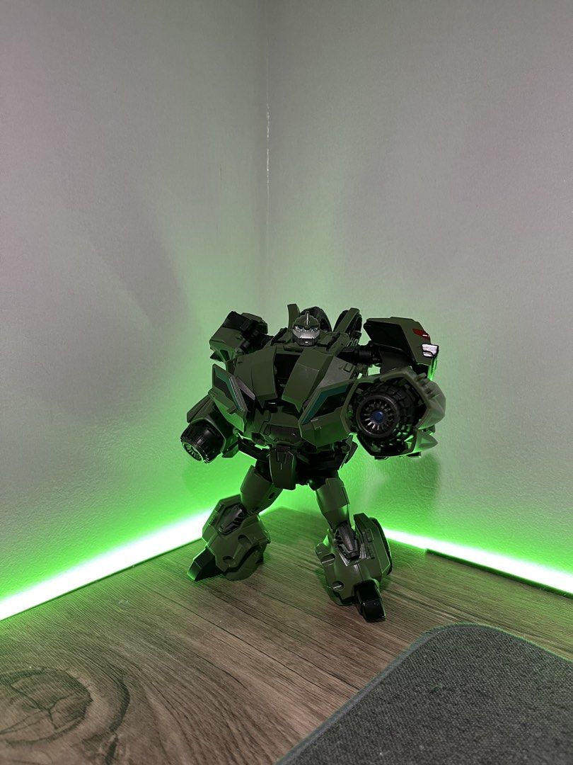 FS / TRADE Bulkhead (Category: Figurines & Statues) located in Quezon City. Submitted by renzo__01 (Listing ID 1468210158, Image 1). Description: - Character: Bulkhead from Transformers Prime - Condition: Great display piece with clean paint and tight joints - Build: Large, sturdy build with detailed green armor plating - Accessories: Includes weapon held in right hand - Ideal for: Robot figure and Transformers collectors.