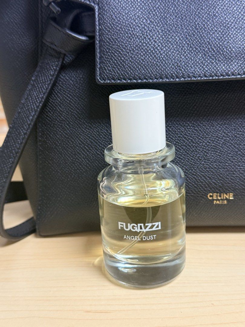 Fugazzi Angel Dust Eau de Parfum (Category: Fragrance & Deodorants) located in Manila. Submitted by scents_and_scentsibility (Listing ID 1468976346, Image 1). Description: - Authentic Fugazzi Angel Dust perfume - Volume: Approximately 3/4 full with box - Scent profile: Versatile and pleasant unisex daily fragrance - Bottle condition: Clear glass with bold white lettering, white cap, and clean, scratch-free label - Storage: Kept away from direct s