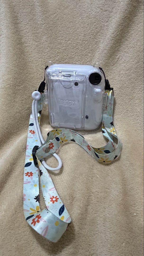 Fujifilm Instax mini 12 (Category: Cameras) located in Mabalacat. Submitted by maligayangthrift (Listing ID 1469054439, Image 2). Description: 📸 Fujifilm Instax Mini 12 Looking for a cute instant camera to capture your favorite memories? 🤍 Selling our Instax Mini 12, lightly used and still ready to make new memories with you! Perfect for birthdays, trips, dates, or simply capturing everyday moments! 💗 📷 Condition: Lightly used, in good condit