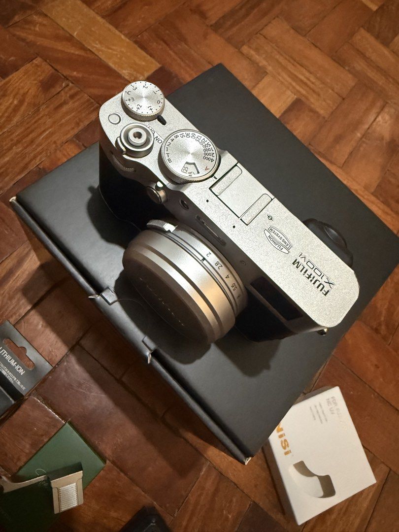 Fujifilm X100VI (300 SC) (Category: Cameras) located in Quezon City. Submitted by ysailafrades (Listing ID 1468942564, Image 3). Description: Fujifilm X100VI Good as new, no signs of usage 300 Shutter Count LCD has screen protector Complete inclusions - battery, strap, cable and box Accessories (take all for ₱5,000) - Squarehood (Glass Haze 10%) - Squarehood Thumb Grip - Nisi NC UV filter - Extra Fujifilm battery NP-W126S - JJC Charger .