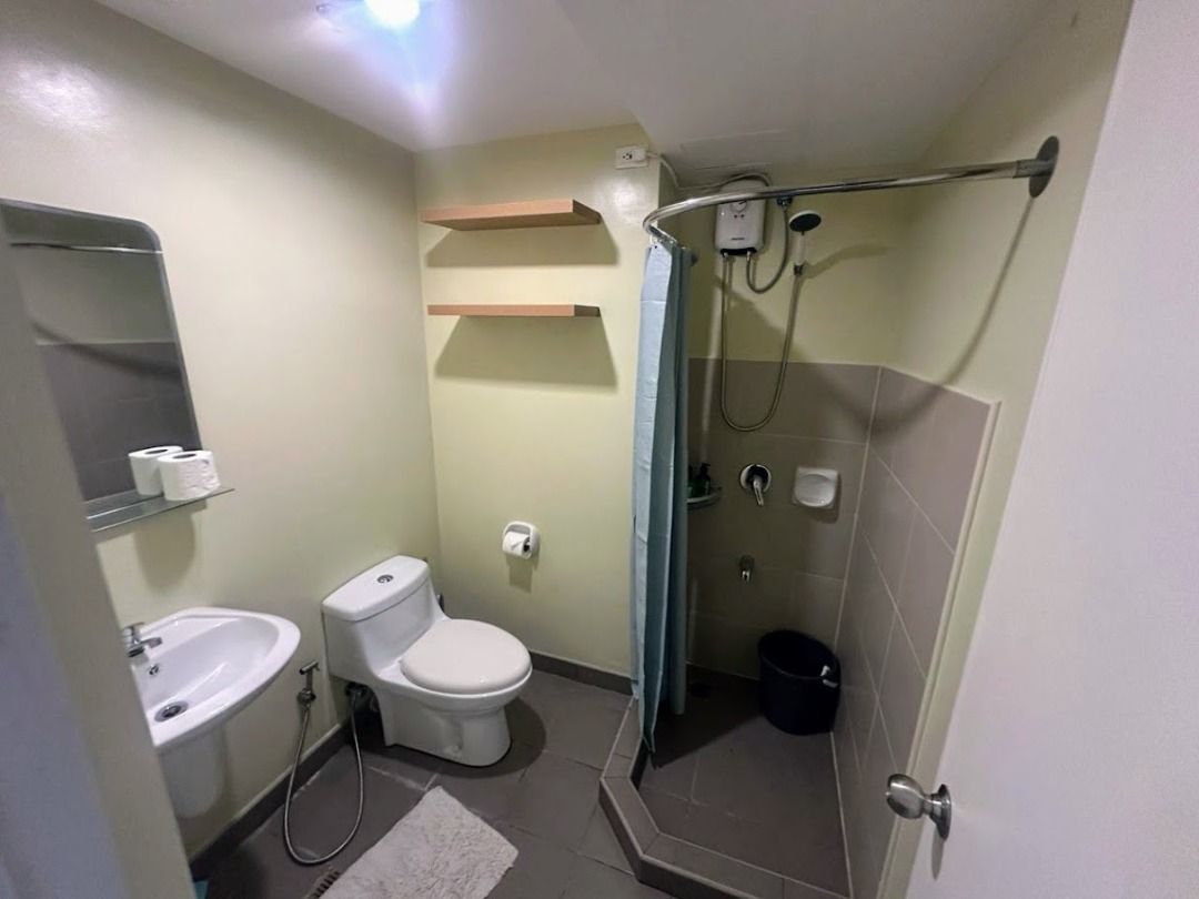 Fully Furnished Studio Unit for Rent (Category: Apartments & Condos) located in Caloocan City. Submitted by itsalonica (Listing ID 1468972762, Image 1). Description: - Compact studio setup with a comfortable double bed and built-in wardrobe - Functional kitchen area with a fridge, sink, and overhead cabinets - Enclosed bathroom featuring a hot and cold shower - Dedicated study desk by the window with a rolling chair - Small dining table for meals