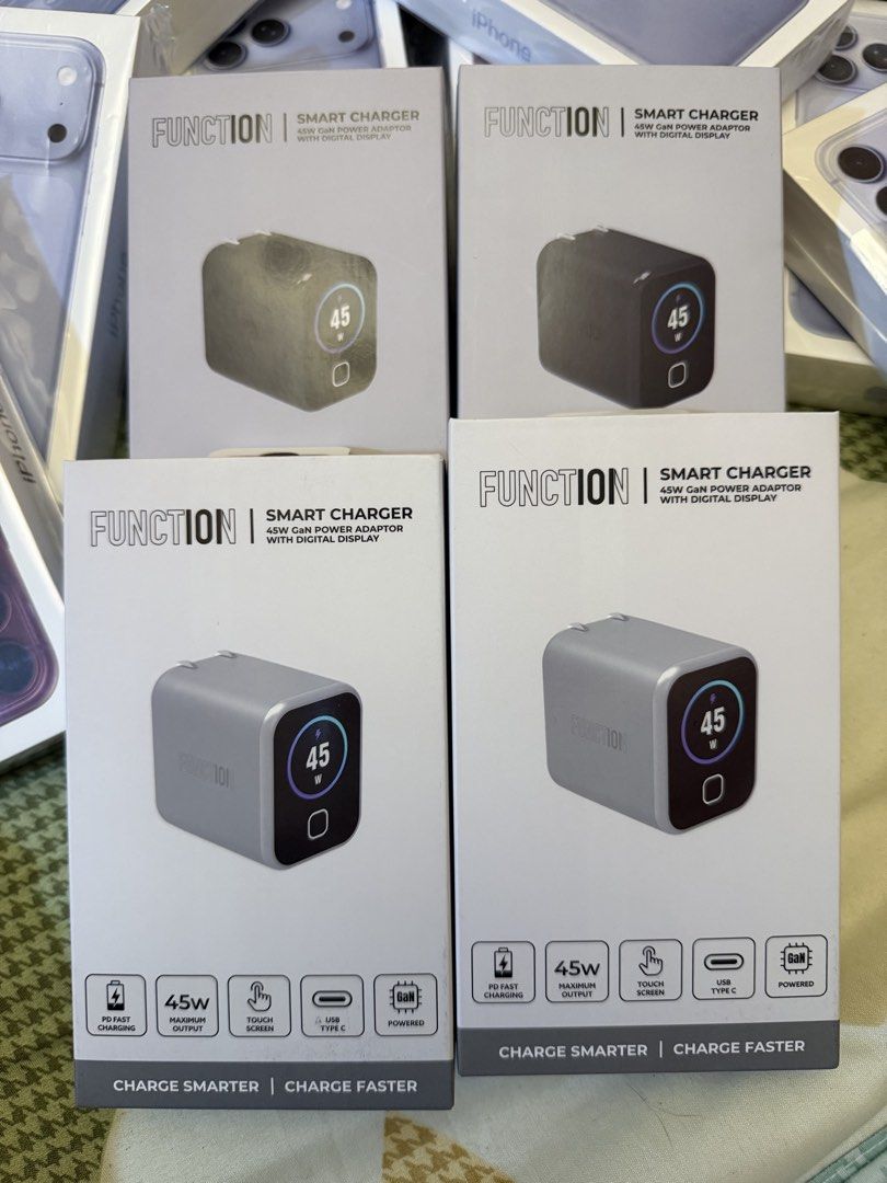 Function101 Smart Charger (Category: Chargers & Cables) located in Quezon City. Submitted by law.1789 (Listing ID 1469101379, Image 3). Description: SRP - 1190 Sale Price - 599 - Brand: Function101 Smart Charger (45W GaN Power Adaptor with Digital Display) - Color: Light Grey - Condition: Brand new in box - Features: PD Fast Charging, 45W maximum output, touch screen, USB Type-C, and GaN powered technology - Smart Real-Time Display: Monitors char