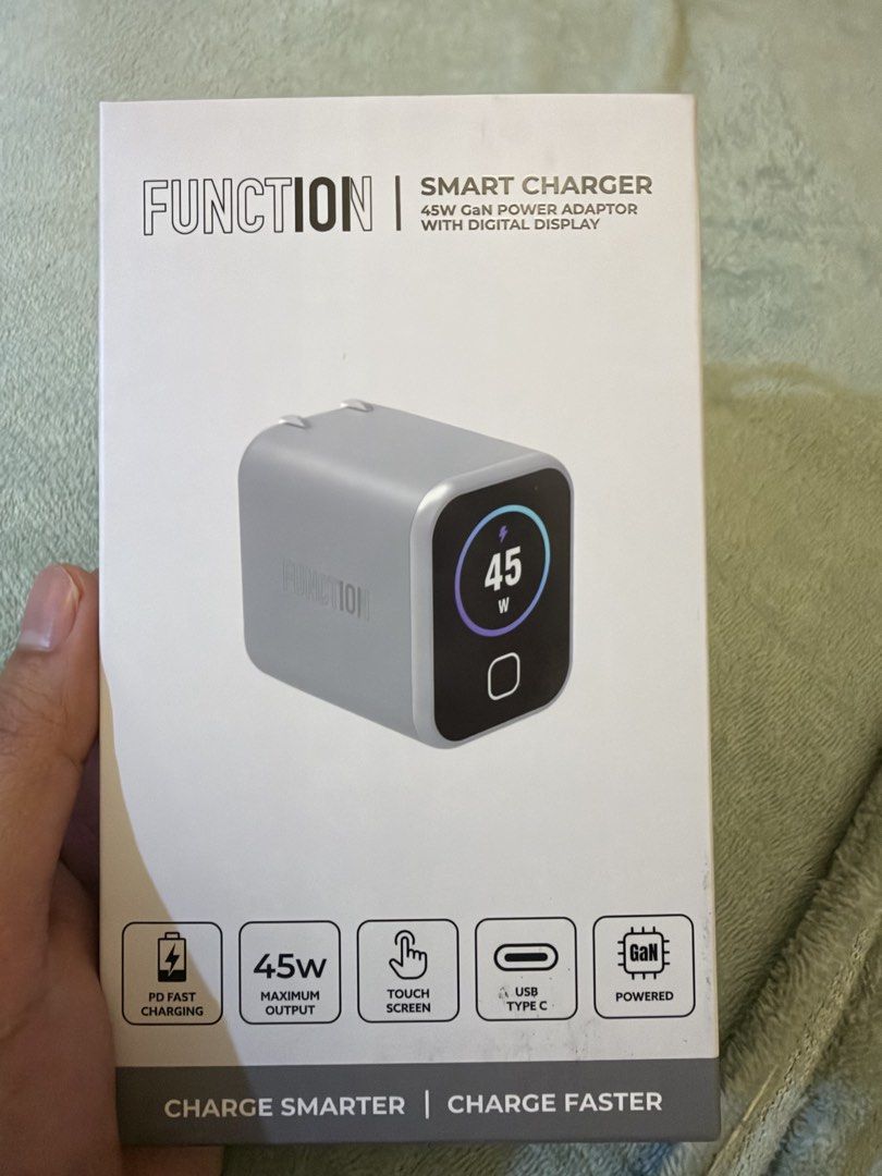 Function101 Smart Charger (Category: Chargers & Cables) located in Quezon City. Submitted by law.1789 (Listing ID 1469101379, Image 1). Description: SRP - 1190 Sale Price - 599 - Brand: Function101 Smart Charger (45W GaN Power Adaptor with Digital Display) - Color: Light Grey - Condition: Brand new in box - Features: PD Fast Charging, 45W maximum output, touch screen, USB Type-C, and GaN powered technology - Smart Real-Time Display: Monitors char