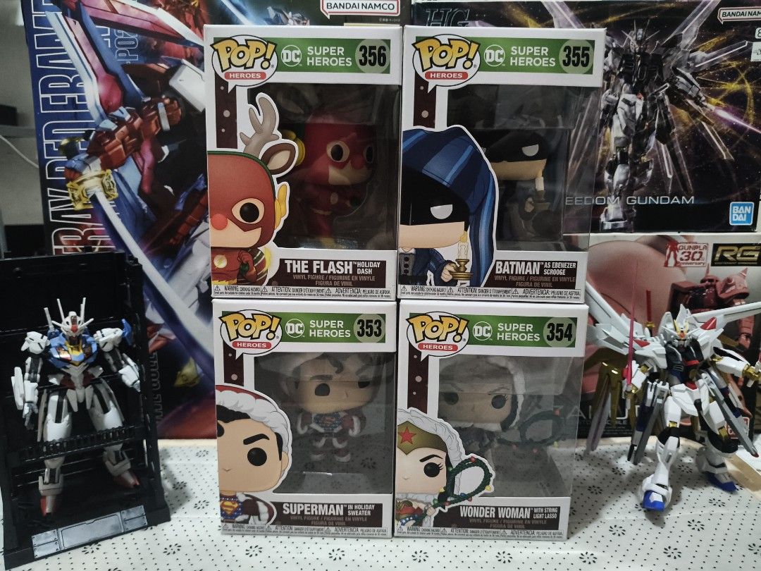 FUNKO POP DC SUPER HEROES CHRISTMAS EDITION (Category: Figurines & Statues) located in Marikina City. Submitted by iamkurbiii (Listing ID 1468994622, Image 1). Description: #353 SUPERMAN (IN HOLIDAY SWEATER) PRICE: 700 #354 WONDER WOMAN (WITH STRING LIGHT LASSO) PRICE: 700 #355 BATMAN (AS EBENEZER SCROOGE) PRICE: 700 #356 THE FLASH (HOLIDAY DASH) PRICE: 700 (All) CONDITION: 9/10 MIB BUNDLE: 2,200 MODE OF PAYMENT - GCASH - GO TYME - BDO.