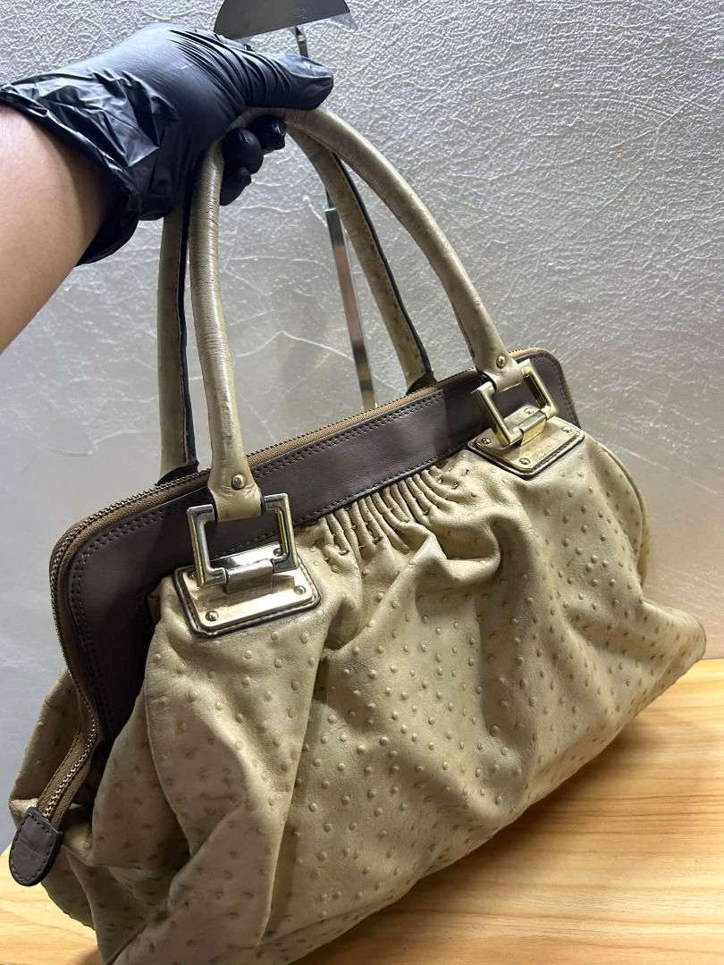 GALADAY SATCHEL HAND BAG OSTRICH LEATHER (Category: Shoulder Bags) located in Caloocan City. Submitted by j3ngsanity (Listing ID 1469095674, Image 3). Description: ISSUE : SIGN OF USAGE / LEATHER SCRATCHES / RUST HARDWARE.