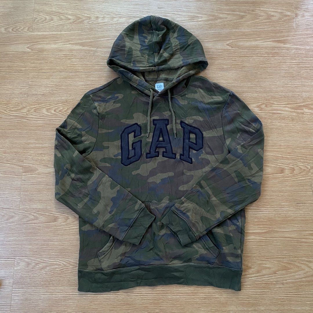 Gap camouflage hoodie (Category: Hoodies) located in Bislig. Submitted by kre_jey.24 (Listing ID 1469078909, Image 1). Description: Dimes 21x26 Medium excellent condition No issue.