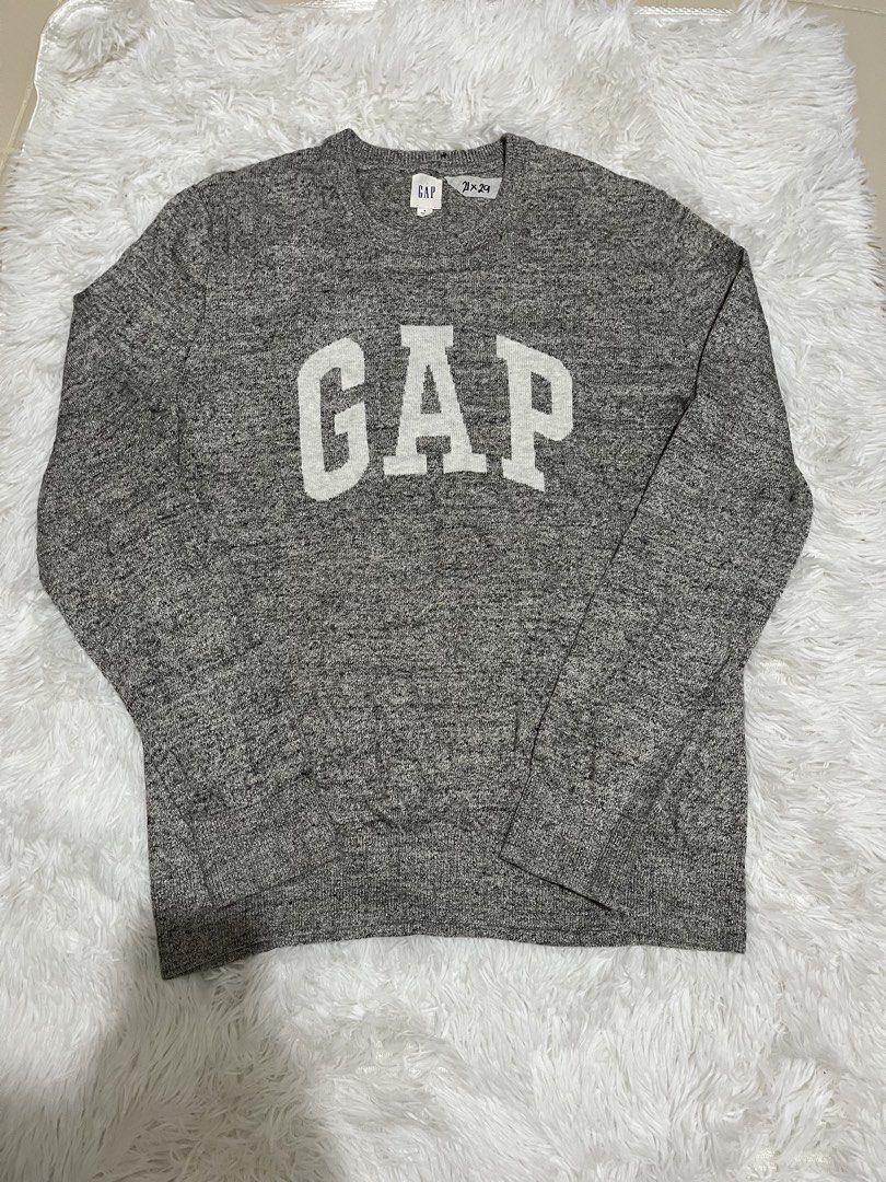 Gap Logo Crewneck Knit Sweater (Category: Coats, Jackets and Outerwear) located in Manila. Submitted by sophianne19 (Listing ID 1469041413, Image 1). Description: Selling an authentic Gap Logo Crewneck Knit Sweater in heather/marl grey. A comfortable cotton-blend knit featuring the classic white arched GAP logo. Ideal for casual wear or layering. • Condition: Like new / No flaws • Size: Medium (M) • Measurements: 21” Width x 29” Length .