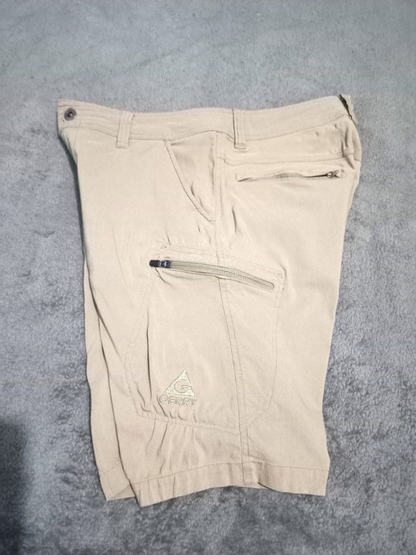 Gerry Outdoor Cargo Stretchable Shorts (Category: Shorts) located in Manila. Submitted by thecomftrift.co (Listing ID 1468978567, Image 3). Description: - Brand: Gerry Outdoor - Color: Beige - Material: Stretchable for comfortable movement - Features: Multiple secure zip pockets on the sides - Condition: Clean, excellent, and ready to wear.