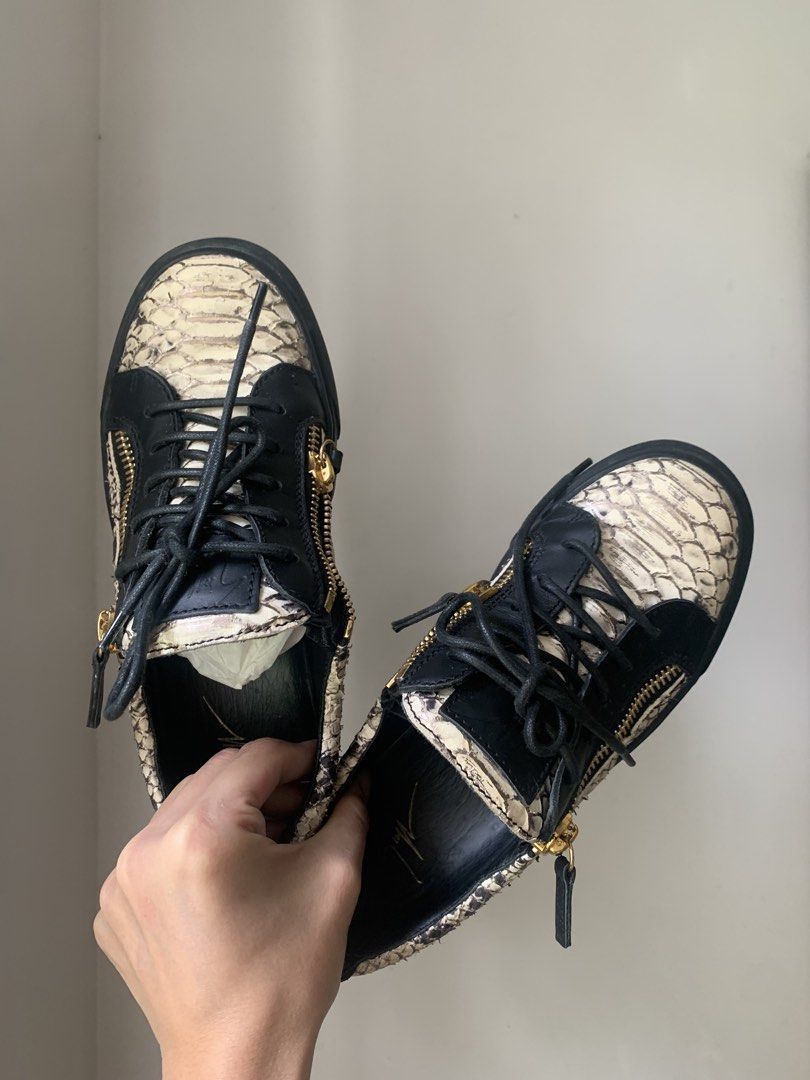 Giuseppe Zanotti Python Print Double Zip Sneakers Size 37 (Category: Sneakers) located in Pasig City. Submitted by bitofahoarder (Listing ID 1468960546, Image 1). Description: - Brand: Giuseppe Zanotti - Style: Low-top sneakers with black laces and dual gold-tone side zippers - Material: Black and white python print leather - Sole: Black rubber - Size: EU 37 (size of this brand runs small so better fits 6.5-7) - Origin: Made in Italy - Inclusions