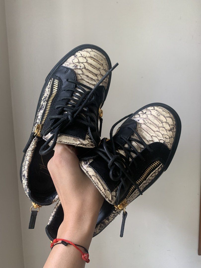 Giuseppe Zanotti Python Print Double Zip Sneakers Size 37 (Category: Sneakers) located in Pasig City. Submitted by bitofahoarder (Listing ID 1468960546, Image 2). Description: - Brand: Giuseppe Zanotti - Style: Low-top sneakers with black laces and dual gold-tone side zippers - Material: Black and white python print leather - Sole: Black rubber - Size: EU 37 (size of this brand runs small so better fits 6.5-7) - Origin: Made in Italy - Inclusions
