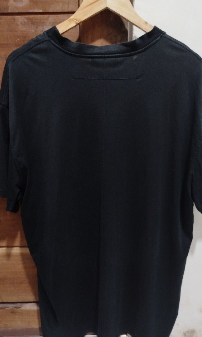Givenchy AW13 Dobermann (Category: Announcements) located in Marikina City. Submitted by jecccc (Listing ID 1468930702, Image 2). Description: Brand: Givenchy Design/Era: Givenchy AW13 Dobermann / FW13 Riccardo Tisci Collection Key Features: Black short-sleeve tee with a front graphic combining a Doberman wearing a silver chain collar and a figure with white hair, accented by a red brush-stroke mark sign of usage.