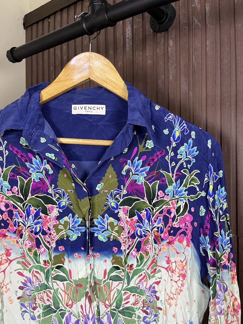 Givenchy Silk Floral Print Button Down Long Sleeve (Category: Formal Shirts) located in Cabanatuan. Submitted by cabsygoods (Listing ID 1469098681, Image 2). Description: Givenchy Silk Floral Print Button Down Long Sleeve Authentic Width: 20.5 Length: 27 (Inches) Very good condition No issue Color rate 9/10 Dm to purchase! 📩.