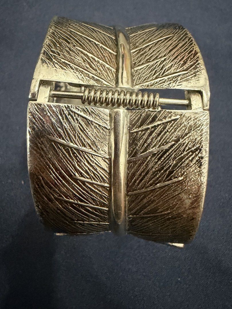 Gold leaf hinge cuff bracelet statement jewelry (Category: Bracelets) located in Makati City. Submitted by petite_preloved2 (Listing ID 1469062169, Image 2). Description: Best fit for 16”- 18” wrist.