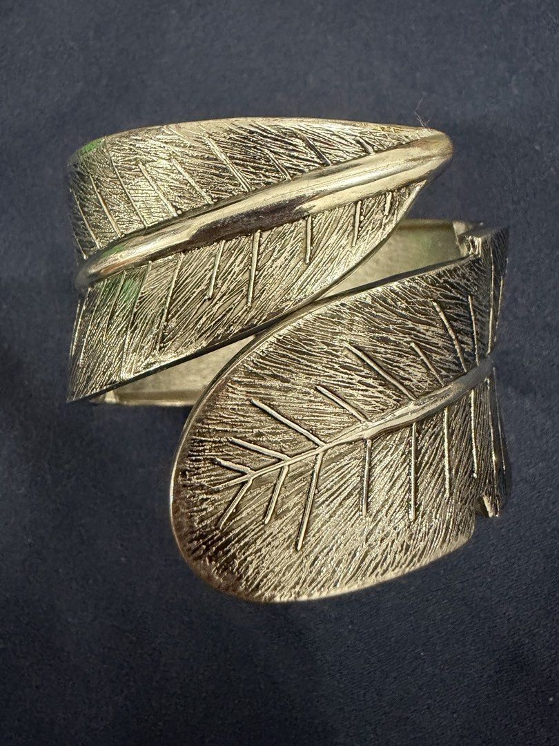 Gold leaf hinge cuff bracelet statement jewelry (Category: Bracelets) located in Makati City. Submitted by petite_preloved2 (Listing ID 1469062169, Image 1). Description: Best fit for 16”- 18” wrist.