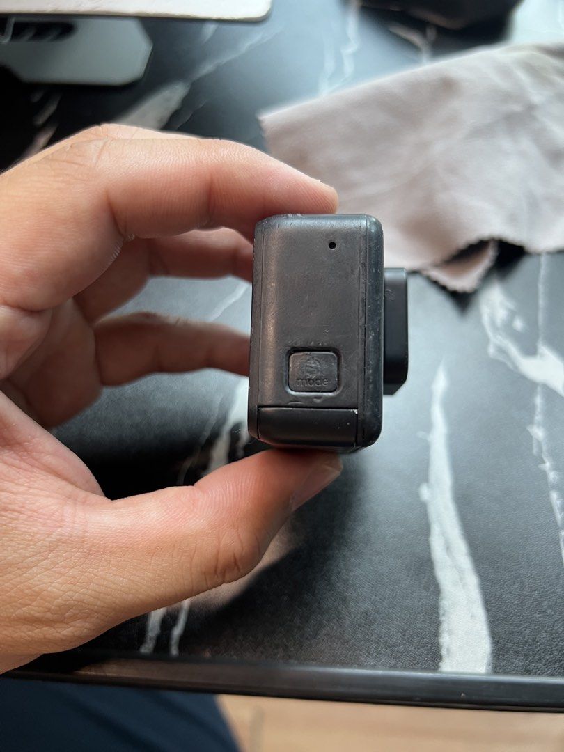 GoPro Hero7 BLACK (Category: Video Cameras) located in Basco. Submitted by wamoanito (Listing ID 1468964365, Image 2). Description: Selling my GoPro HERO7 Black! Used it for years of diving with an underwater case, but I’m back in school and can no longer dive. Has battle scars and some scratches from use, but still works perfectly fine! Inclusions: • 90° angle mount • GoPro clip mount • 3 batteries (2 original, 1 non-original) • 2 protective fra