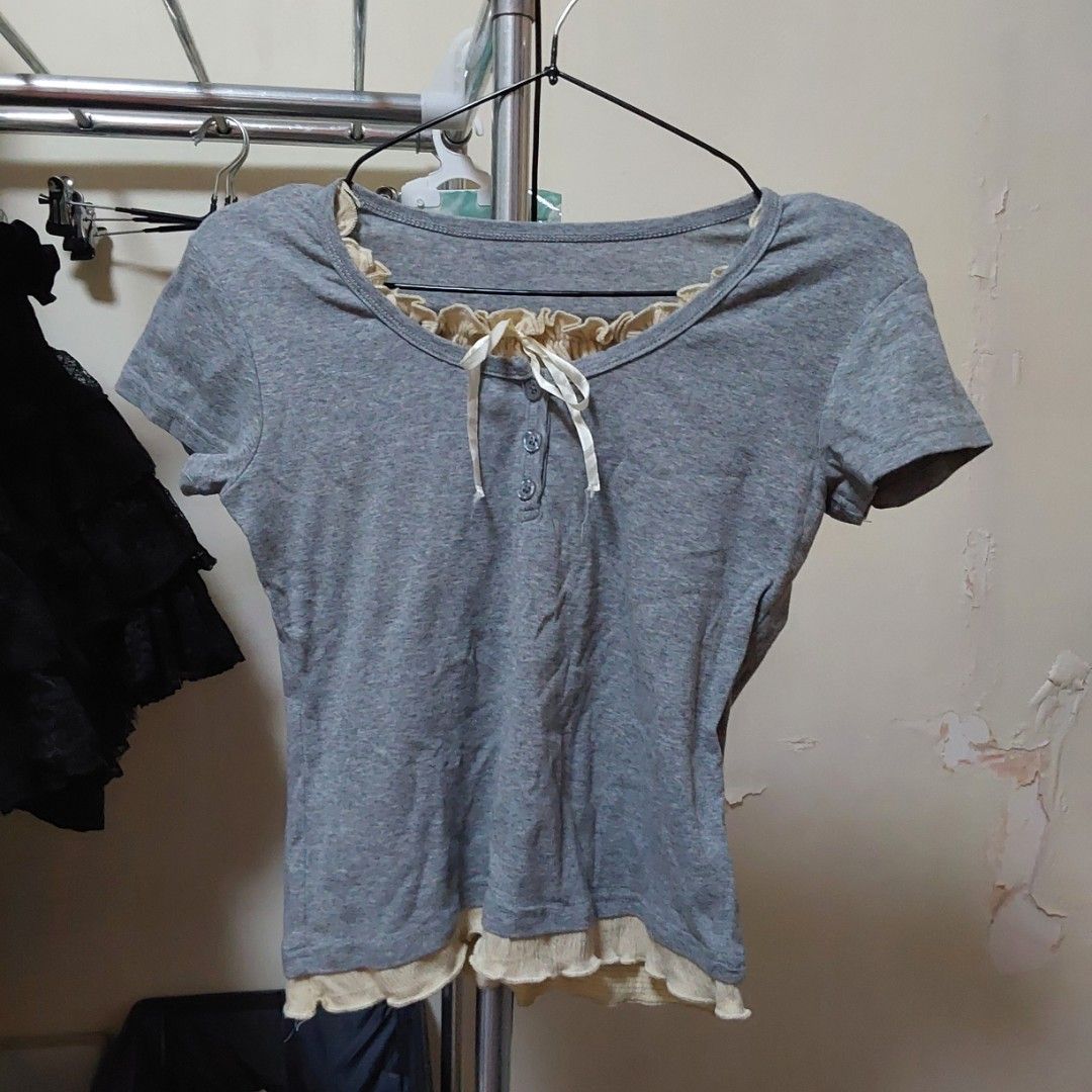 Gray layered top (Category: Shirts) located in Magarao. Submitted by cinabonthrifts (Listing ID 1469089451, Image 1). Description: Issue: The ribbon has some frays Size: s-m MOP: Gcash MOD: Jnt.