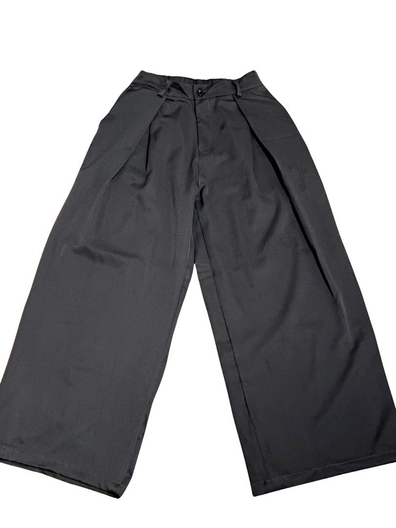 Gray Wide Leg Pleated Trousers (Category: Trousers) located in San Pablo. Submitted by gabbydcl (Listing ID 1469030818, Image 1). Description: Gray Triple Pleated Trousers Used once for an event Waistline: 33-40.