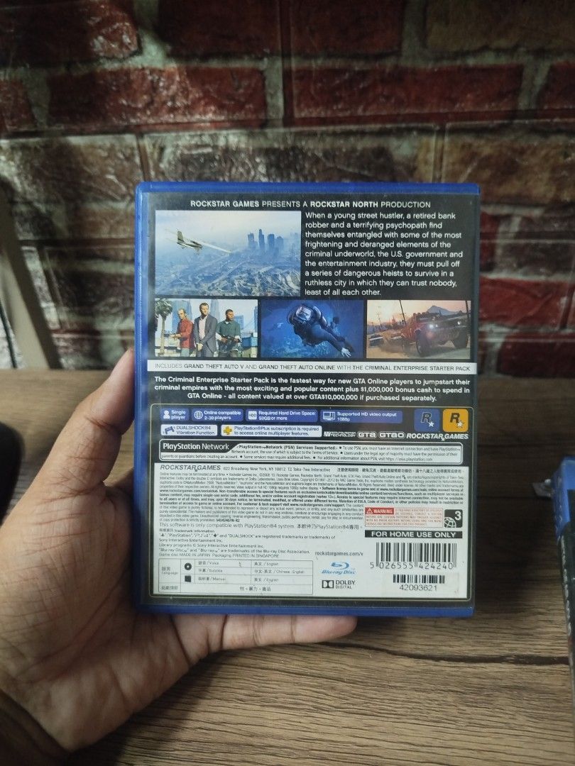 GTA V Premium Edition PS4 Game (Category: PlayStation) located in Binan City. Submitted by pumpkiiin02 (Listing ID 1468990429, Image 2). Description: - Title: Grand Theft Auto V Premium Edition - Platform: PlayStation 4 (PS4) - Inclusions: Original game disc and Criminal Enterprise Starter Pack insert - Condition: Case and artwork are in good shape, game works perfectly - Region: Asian release.