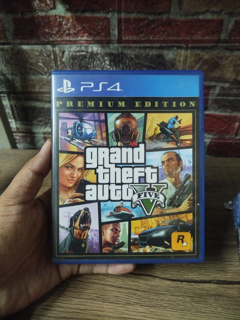 GTA V Premium Edition PS4 Game (Category: PlayStation) located in Binan City. Submitted by pumpkiiin02 (Listing ID 1468990429, Image 1). Description: - Title: Grand Theft Auto V Premium Edition - Platform: PlayStation 4 (PS4) - Inclusions: Original game disc and Criminal Enterprise Starter Pack insert - Condition: Case and artwork are in good shape, game works perfectly - Region: Asian release.
