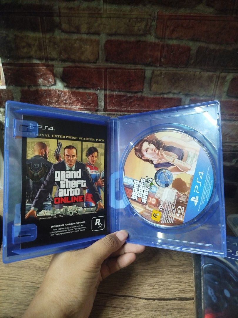 GTA V Premium Edition PS4 Game (Category: PlayStation) located in Binan City. Submitted by pumpkiiin02 (Listing ID 1468990429, Image 3). Description: - Title: Grand Theft Auto V Premium Edition - Platform: PlayStation 4 (PS4) - Inclusions: Original game disc and Criminal Enterprise Starter Pack insert - Condition: Case and artwork are in good shape, game works perfectly - Region: Asian release.