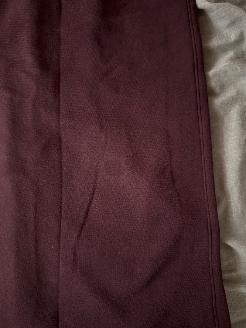 GU — Midi Jersey Skirt (Category: Skirts) located in Manila. Submitted by tricia_lara (Listing ID 1468978585, Image 3). Description: Actual color is more of maroon/deep red? 😅 Only worn this once from japan trip but Idk there’s a dot (see photo) but i have never tried washing it off 😅 but in good condition~ Shipping via grab/lalamove only 📍Taft Manila.