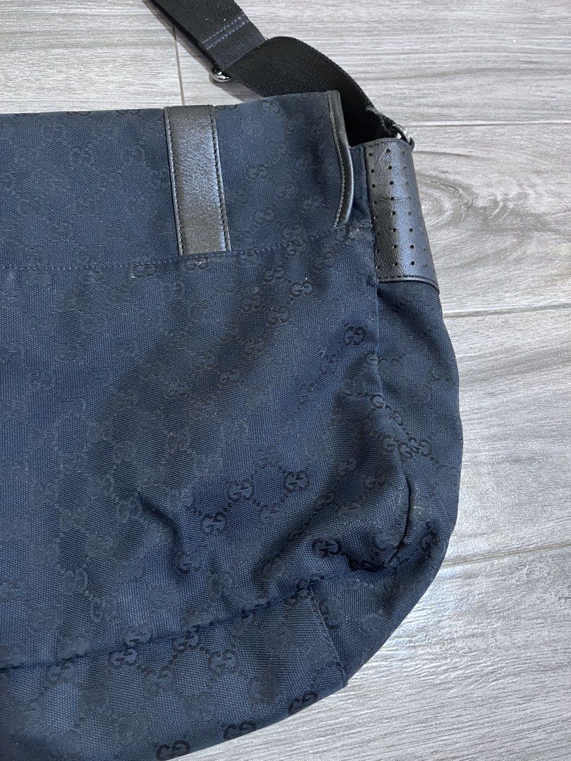Gucci (Category: Shoulder Bags) located in Dagupan City. Submitted by calmocean-f675cc (Listing ID 1468983833, Image 3). Description: Gucci Monogrm Messenger bag Authentic Black 5250 add sf.