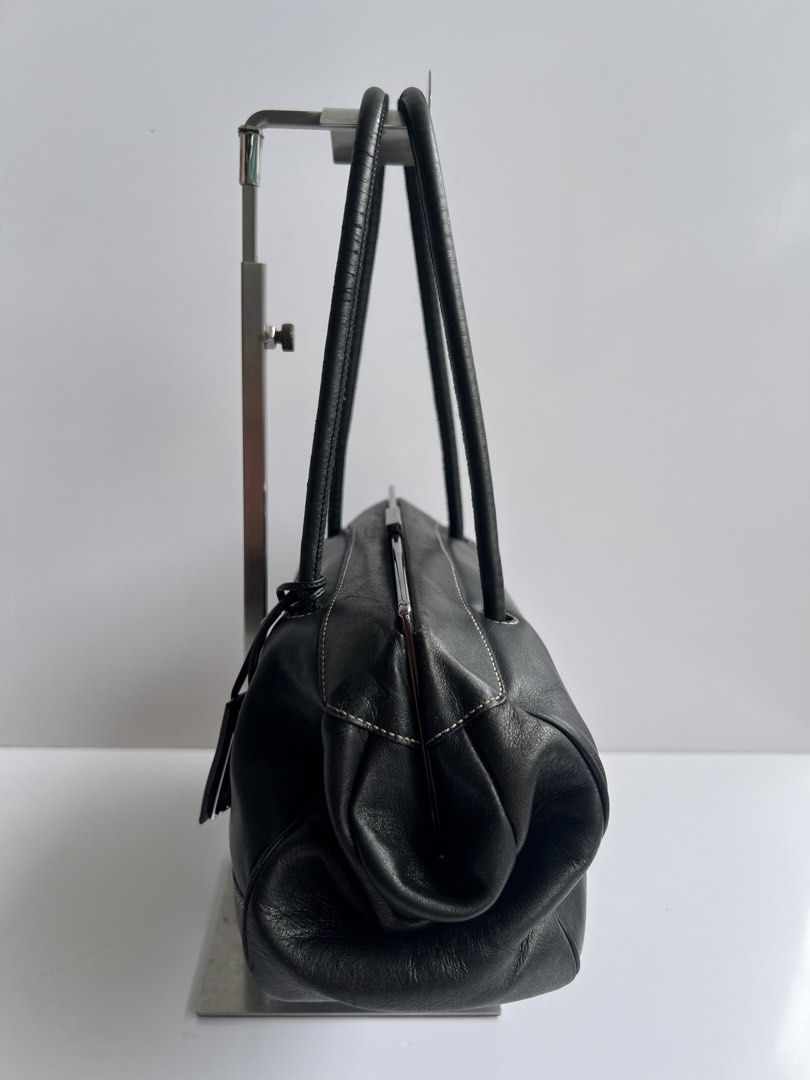 GUCCI - BLACK CLASP CLOSURE LEATHER SHOULDER BAG (Category: Luxury Bags & Wallets) located in Cavite. Submitted by _Gizmo (Listing ID 1469019316, Image 3). Description: Gucci - Clasp Closure Leather Shoulder Bag Measurement Width: 12’ Inch Height: 6’ Inch Depth: 5’ Inch Rank AB Normal sign of wear scratch on leather , rubs. Made in Italy.