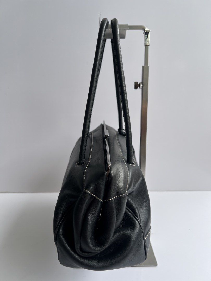 GUCCI - BLACK CLASP CLOSURE LEATHER SHOULDER BAG (Category: Luxury Bags & Wallets) located in Cavite. Submitted by _Gizmo (Listing ID 1469019316, Image 2). Description: Gucci - Clasp Closure Leather Shoulder Bag Measurement Width: 12’ Inch Height: 6’ Inch Depth: 5’ Inch Rank AB Normal sign of wear scratch on leather , rubs. Made in Italy.